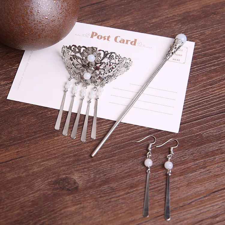 

Ancient style headdress Chinese style Hanfu hairpin classical costume female student hairpin retro tassel step shake