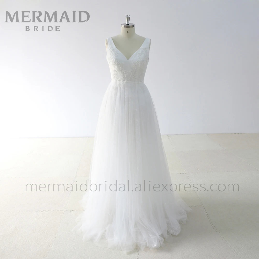

Backless Beaded Lace Bohemian Wedding Dress
