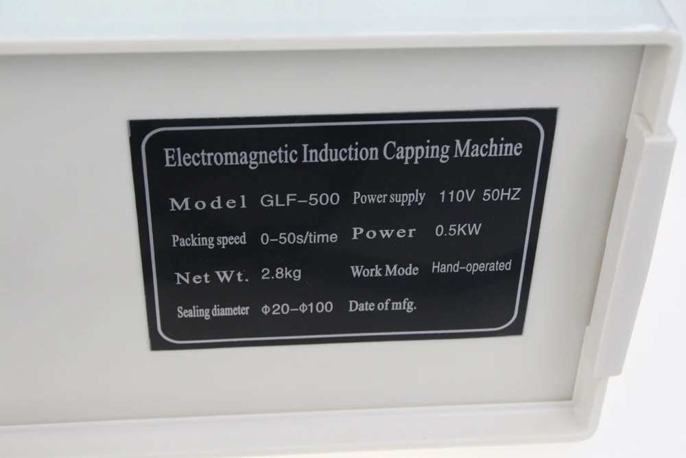 

Free Shipping,100% New Portable Induction Foil Cap Sealer,Manual aluminium foil sealing machine