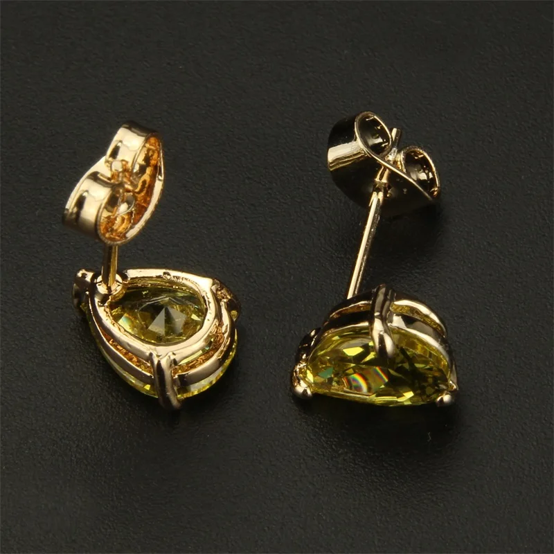 Женские серьги-гвоздики с зеленым фианитом LINDA FOLHEADOS | Украшения и аксессуары