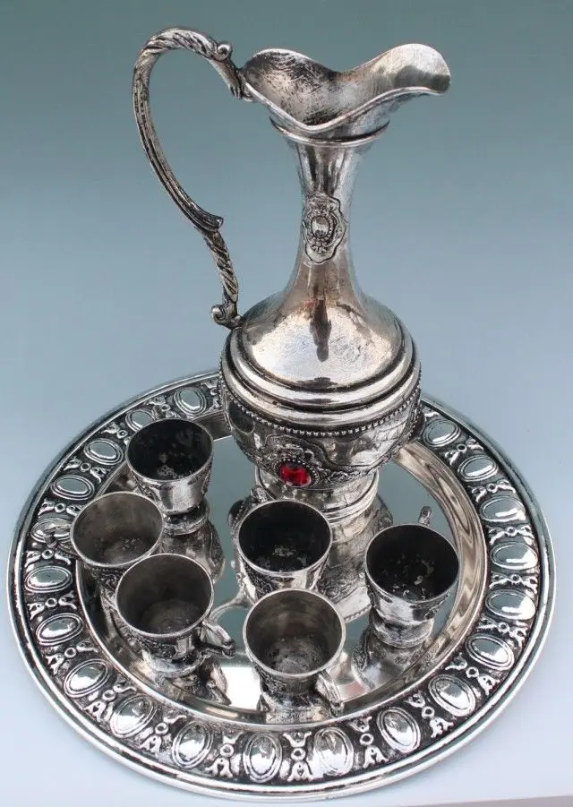 

In ancient China, gold-plated silver opal teapot and cups and tray