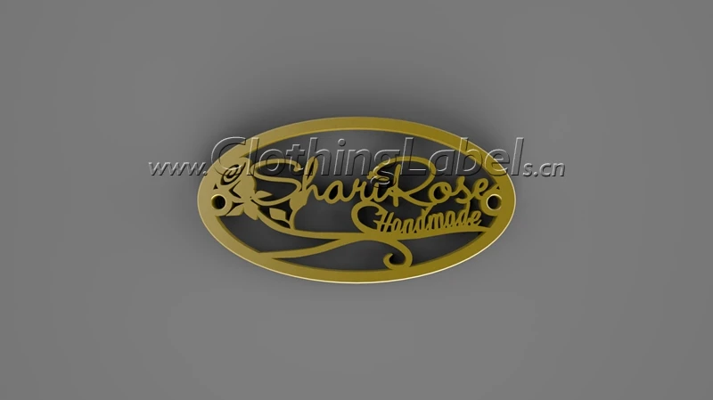 

Custom matt gold beautiful logo shape zinc alloy metal label with holes sewing for garment and bags