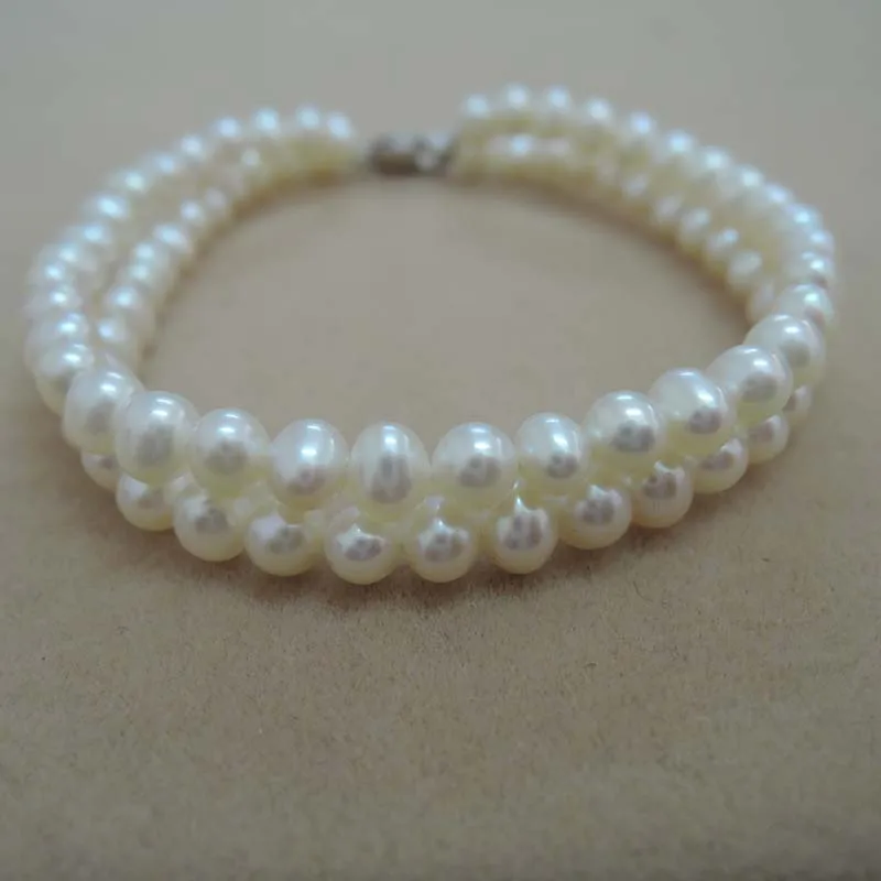 

high quality 2 layer pearl BRACELET made of 100% NATURE FRESHWATER PEARL -AAA PEARL ROUND SHAPE ,MINI pearl 3-5 mm twist