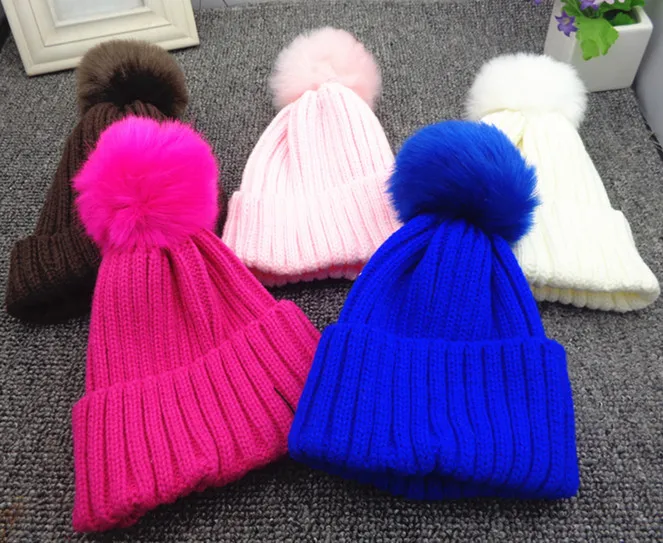 Autumn and winter children thickened candy colored wool ball wool hat Korean version warm ear knitted cap male female baby head