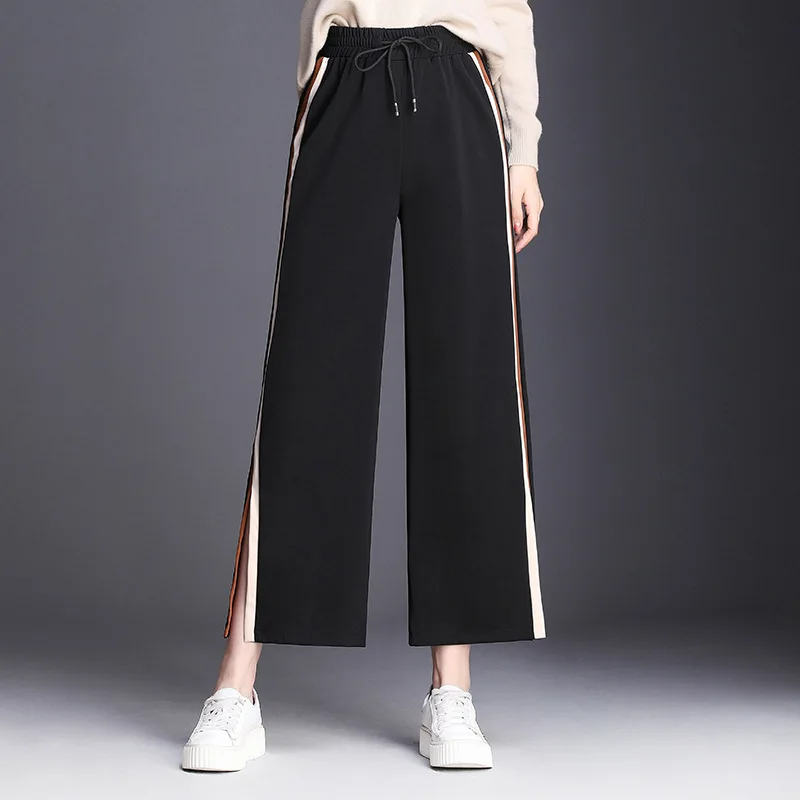 Женские свободные штаны с поясом и студенческими штанами полосками по бокам