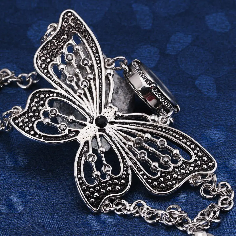 

HOT SALE Classic Retro Black Titanium Silver Women Quartz Wrist Watch Stylish Oversize Butterfly Bracelet Watch Cute Mini Dial