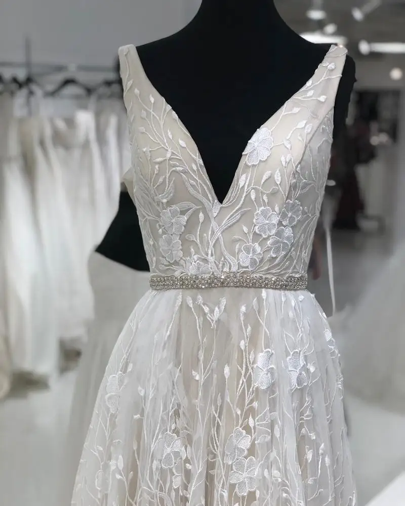 

2019 Elegant pretty deep V neck design beach design bridal gowns vestido de novia beaded sash brush tail wedding dress HA018