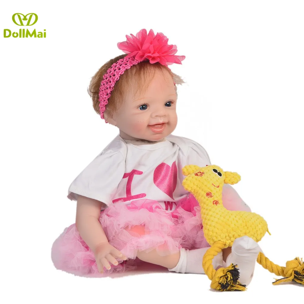 

2inch soft Silicone Reborn Baby Dolls Unique smile Bebe girl reborn Lifelike princess wear 0-3M real clothes children gift toy