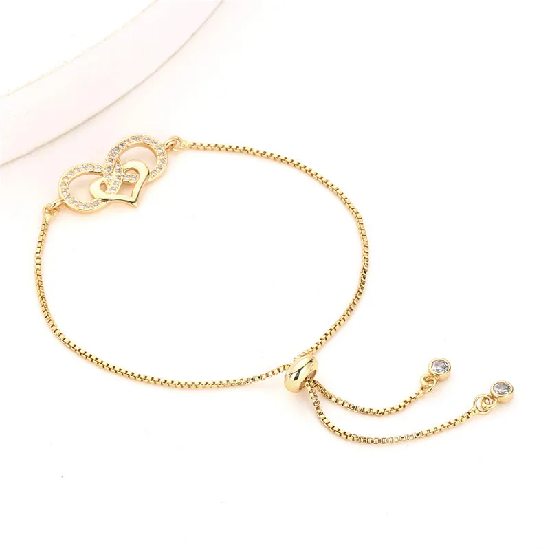 Женский браслет на запястье с кубическим цирконием сердце бесконечности золотая