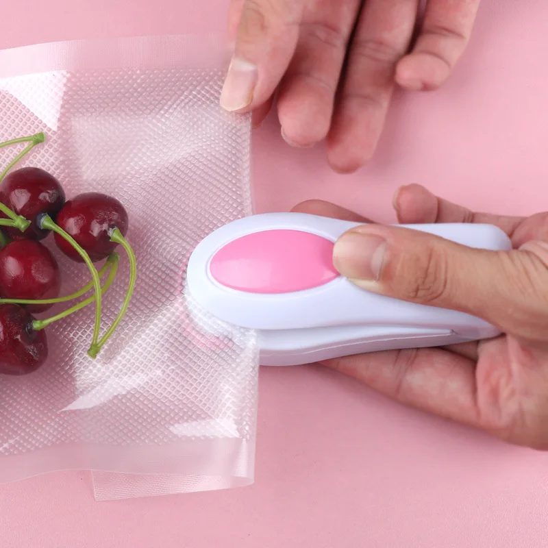 

Outdoor/home portable mini electric heat sealing machine food snack sealing machine household hand pressure heat sealing machine