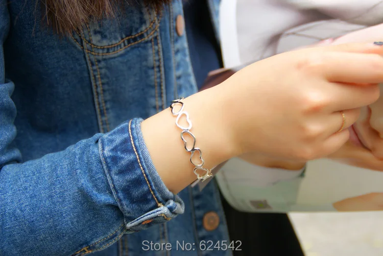 

Korean pop female ornaments lovely heart-shaped bracelet. 925 sterling silver bracelet hollow out openings. Love gift