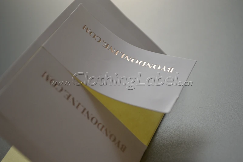

Custom clothing label sticker, adhesive sticker, red copper hot stamping