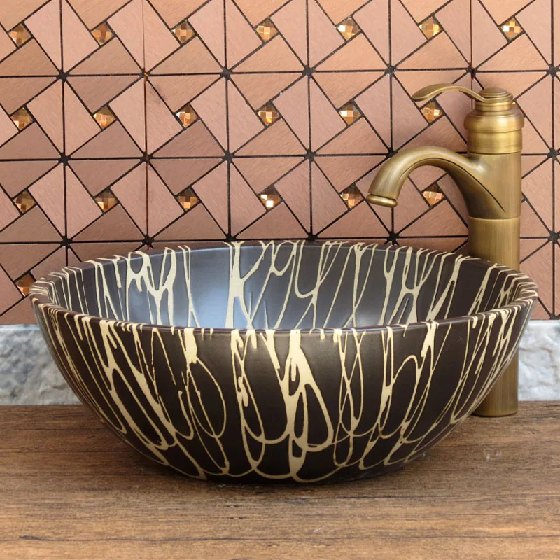 Средиземноморский круглый стол черный умывальник ванная комната керамический