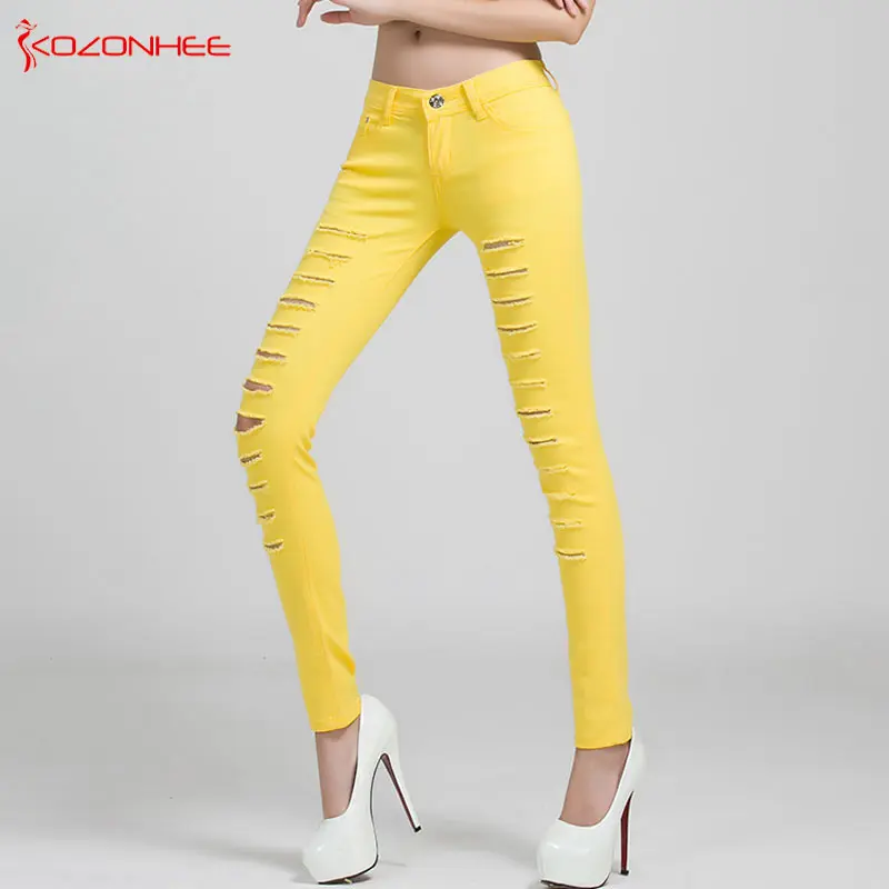 Мультиплексные цветные тянущиеся узкие джинсы с дырками женские эластичные