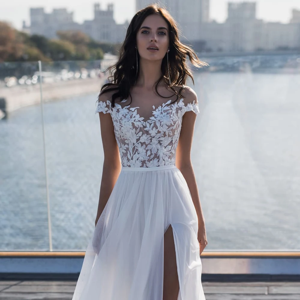 Модное богемное свадебное платье с глубоким вырезом и рукавами крылышками