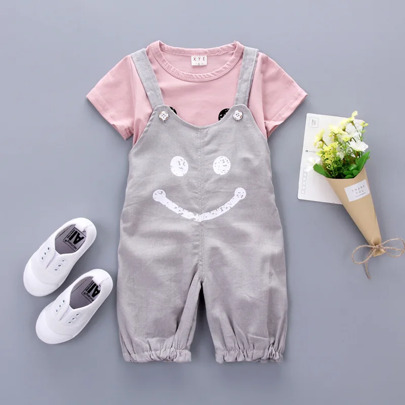 New baby suit in the summer of 2017 boys and girls smiling face coat + suspenders 2 times children clothing collection |