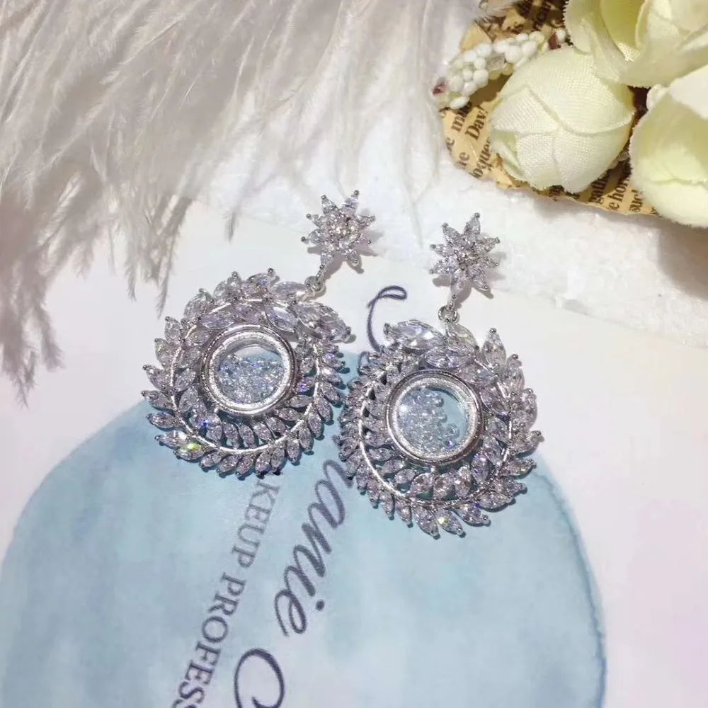 Роскошные сережки из оливковой ветки высшего качества с фианитом Новое