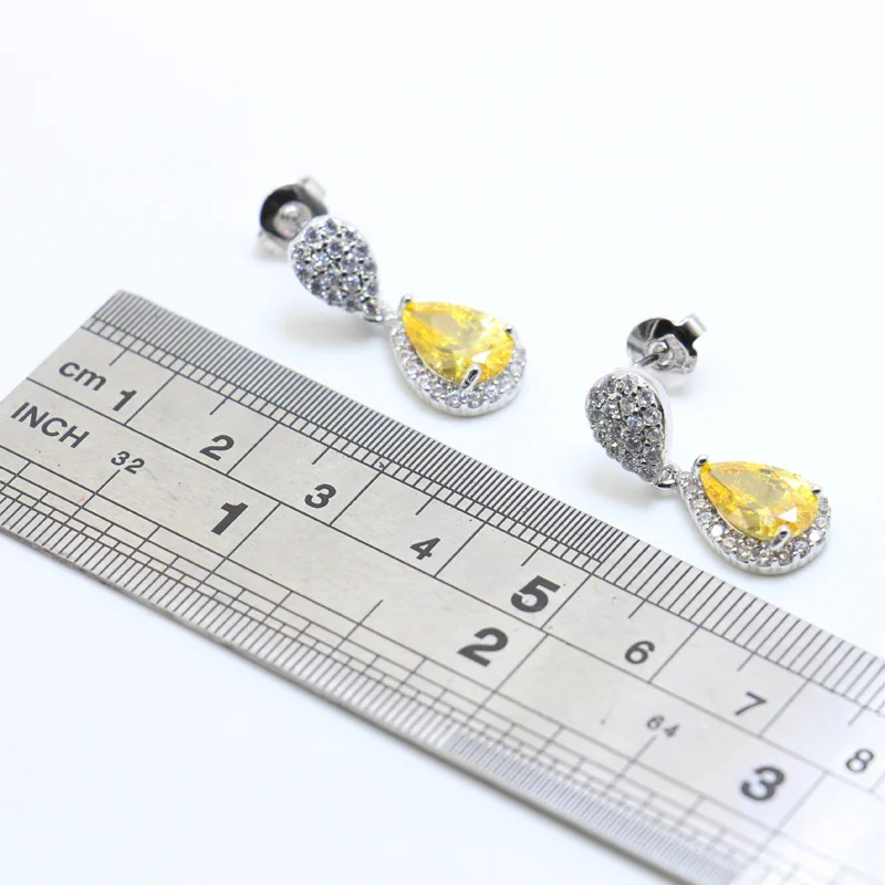 Элегантные женские серьги капельки циркониевые Королевского золота желтый