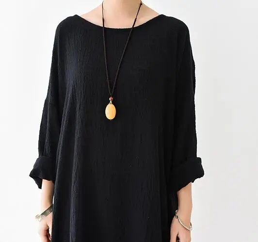 Женское платье с карманами черное элегантное цельнокроеное большого размера в