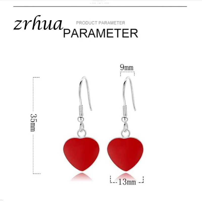 Женские серьги подвески серебряного цвета с красными