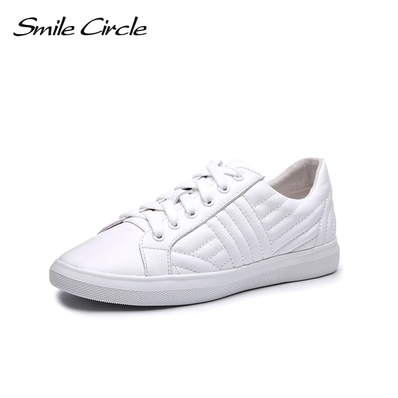 Женские кроссовки Smile Circle белые и черные из натуральной кожи на плоской подошве