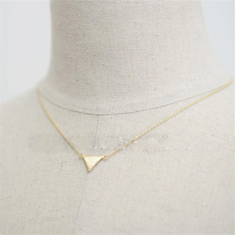 

Fashion triangle pendant Personality on the surface of wire drawing triangular pendant for women