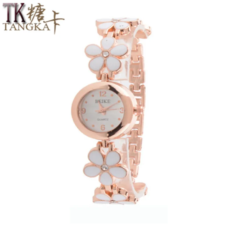 Модные дизайнерские женские часы розовое золото на ремешке с цветочным узором