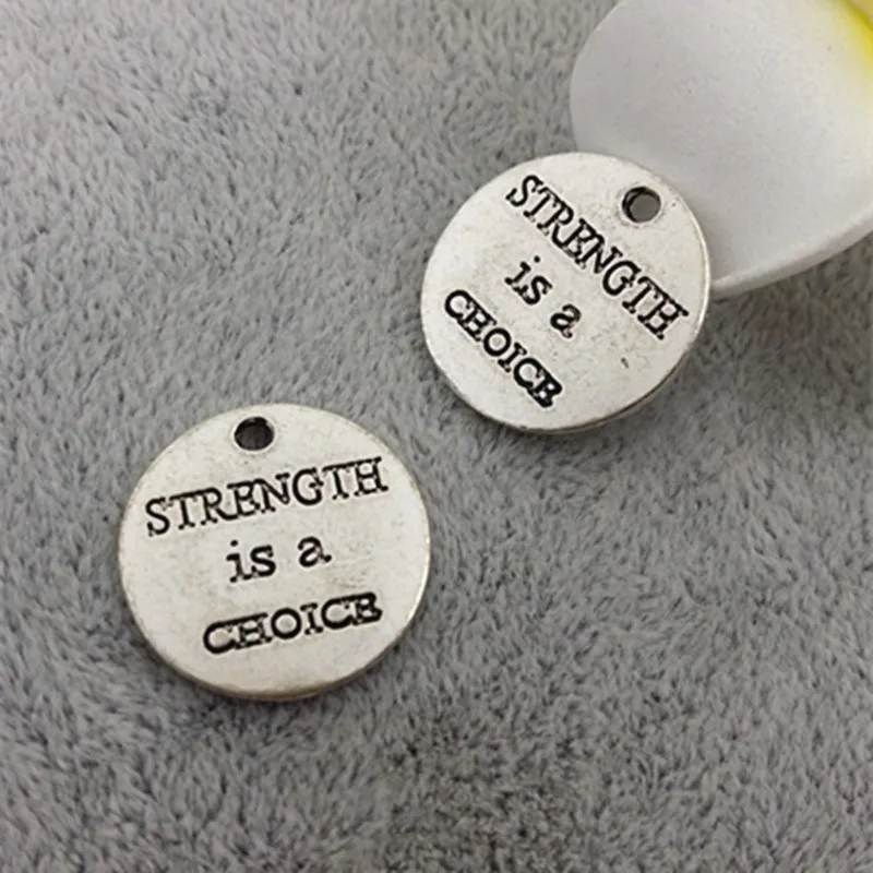 

10 Pieces/Lot 20mm Silver Plated Round Disc Letter Charm Strength Is a Choice Message Charms 3060