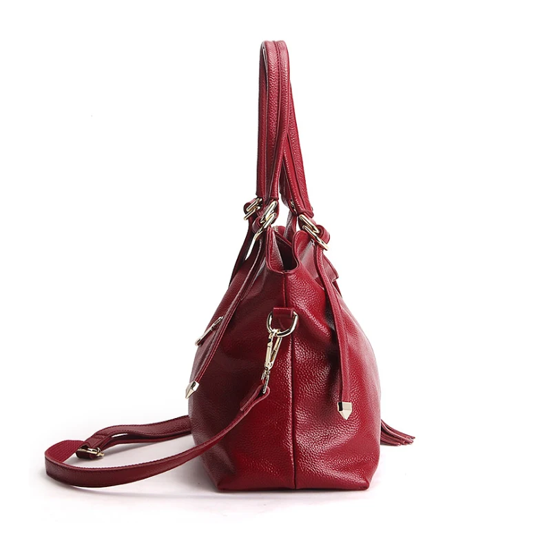 Вместительная сумка тоут из натуральной кожи с кисточками 35*27*15 см женская через