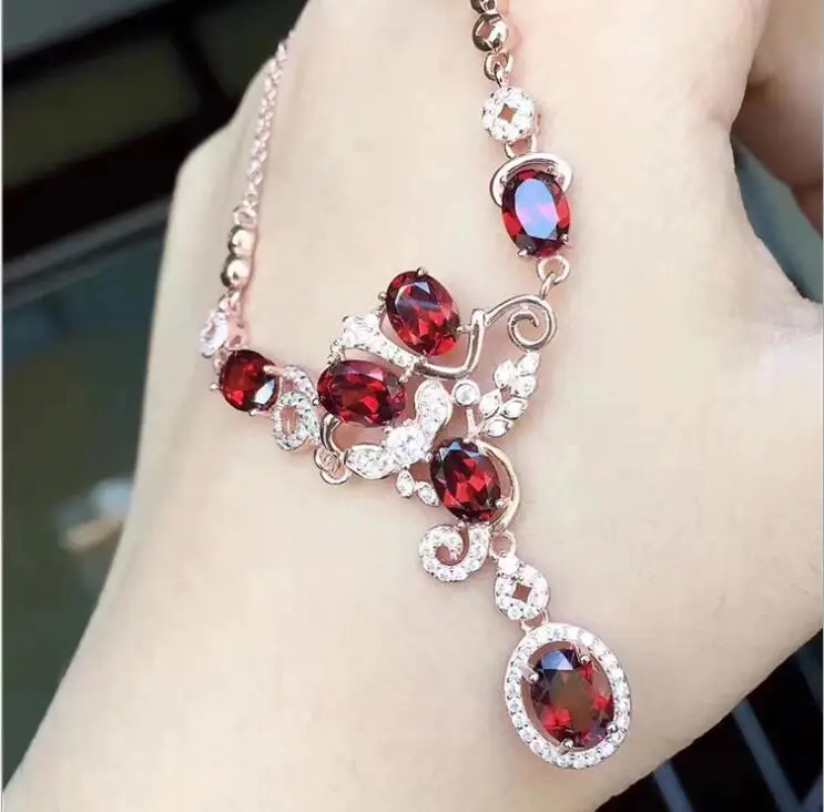 

KJJEAXCMY boutique jewels 925 pure silver inlaid with natural garnet female pendant ring earrings 3 pieces of jewelry.