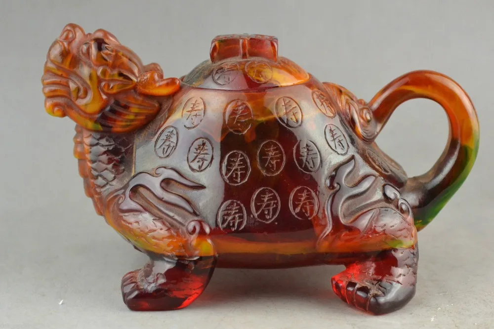 

Elaborate rare collection Artificial amber resin dragon turtle adornment teapot