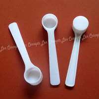 100pcslot 0 5g plastic scoop 0 5 gram pp measuring spoon 1ml measure tool 70x16x10 5mm white free shipping