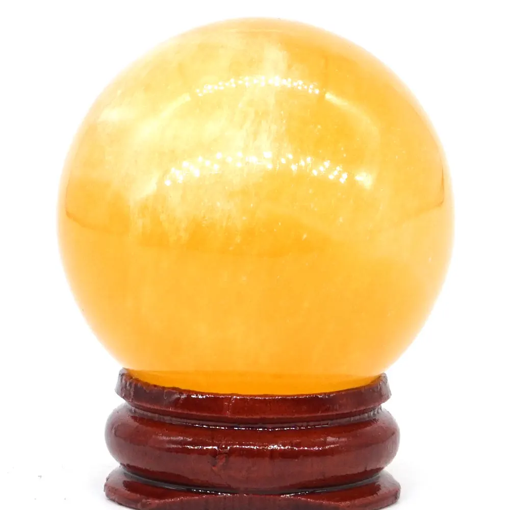 Шар из натурального оранжевого гипса селенита атласный спиральный шар