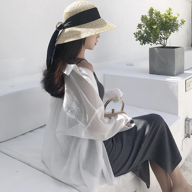 

Summer chic female Han van loose thin temperament all-match sexy thin long sleeved sunscreen shirt in the long perspective