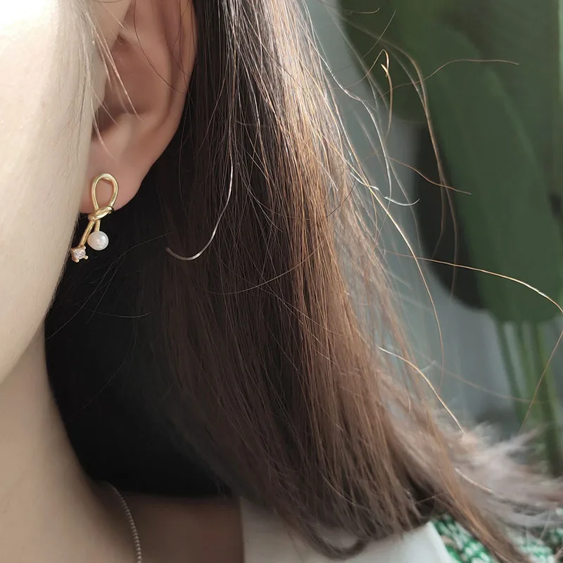 

PONYKISS Trendy S925 Sterling silver Delicate Bowknot Pearl Stud Earrings Nordic Style Elegant Accessory Women Party Chic Gift