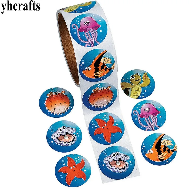 

1 Roll(100PCS)/LOT.Sea world ocean animals paper stickers Home decoration Activity crafts School reward label Classic toy Funny