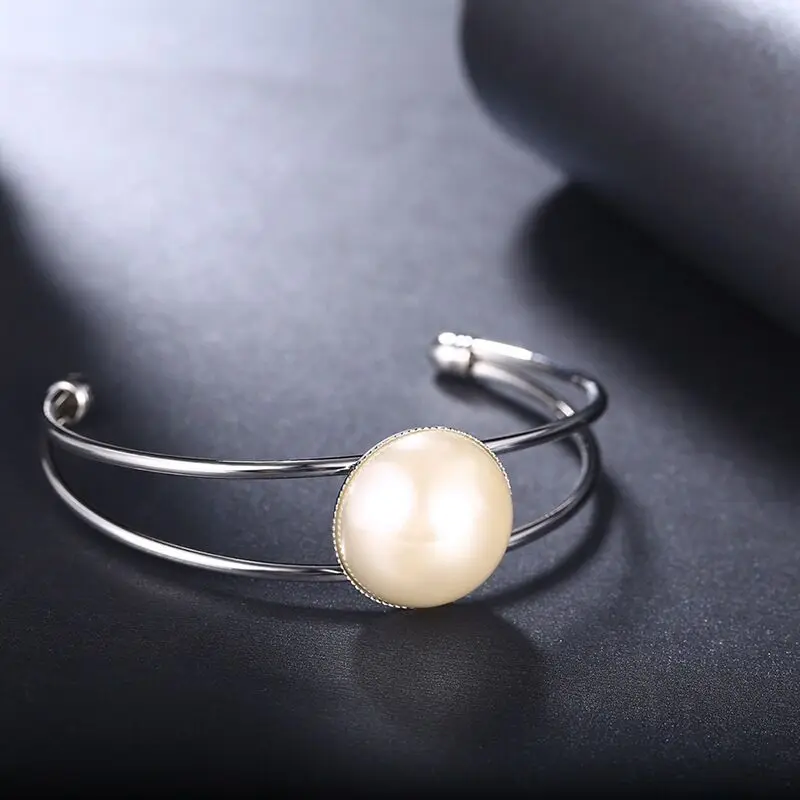 New European-American Pop Pearl Jewelry Fashion Women's Ring Titanium Steel Zircon Festival Gifts Simple and Elegant Personality |