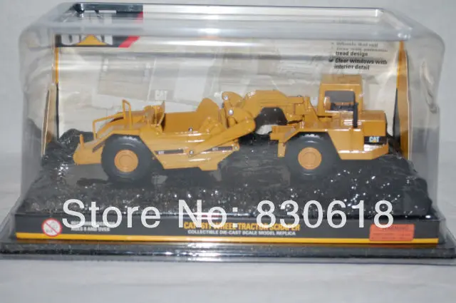 

Norscot Cat 611 Wheel Tractor Scraper DIECAST 1:64 NEW IN BOX COLLECTIBLE toy
