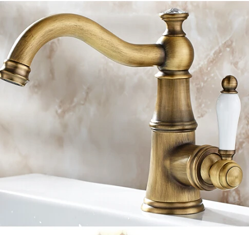 

Free Shipping Solid Brass Bathroom Sink Basin Faucet Antique Brass Ceramics Handle Retro Style Mixer Tap Deck Mounted Water Tap