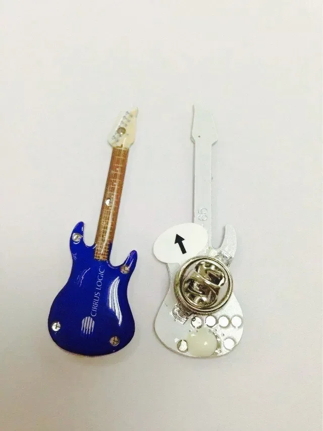 

The led flash brooch guitar LED Flashing Brooch Pin Light Up Glowing Badge Party