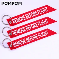 3pcslot remove before flight key chians for aviation gifts red print streamer aviation keychain key tags holder sleutelhanger