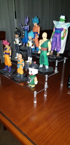 

Clear acrylic cosmetics storage rack detachable Cartoon character ladder frame holder toy car model purse perfume display stand