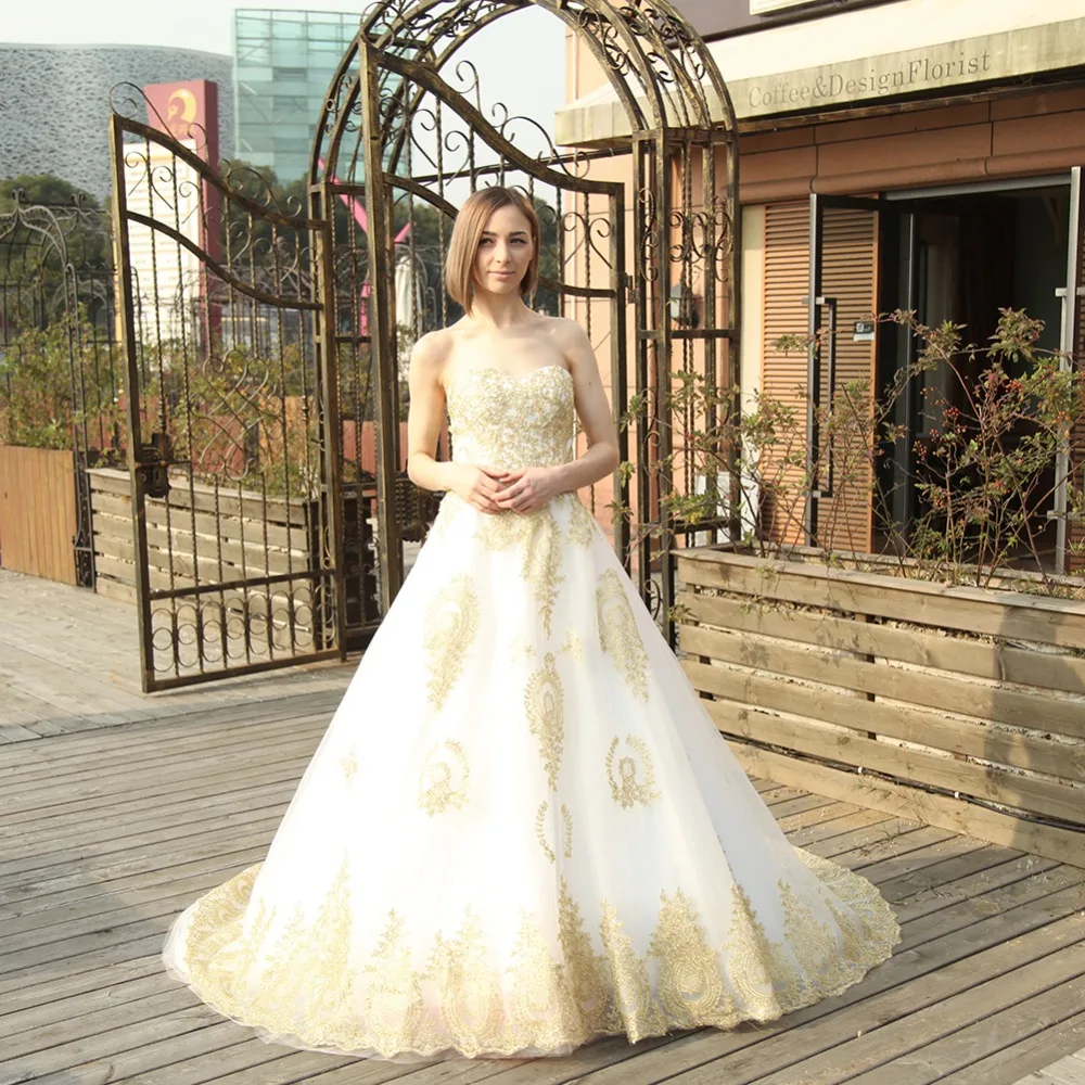 Wowbridal свадебное платье трапециевидной формы с вышивкой золотистого цвета белым