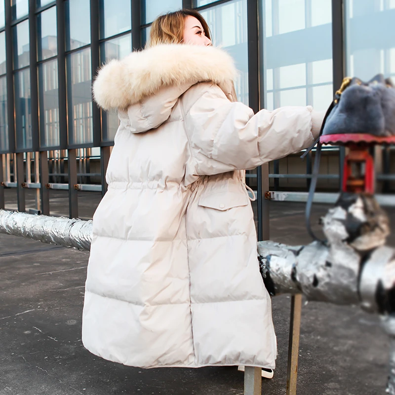 Фото Large raccoon dog fur collar loose fit thickening warm winter duck down jackets women coats outerwear 2019 autumn Женская одежда Large raccoon dog fur collar loose fit thickening warm winter duck down jackets women coats outerwear 2019 autumn Женская одежда