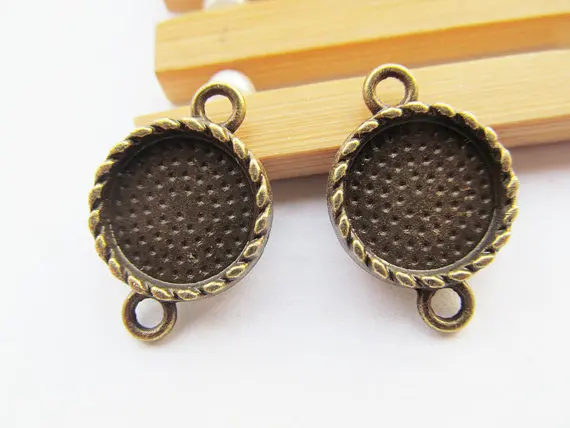 100 шт. античная серебряная/бронзовая Поворотная основа для рамки Очаровательная