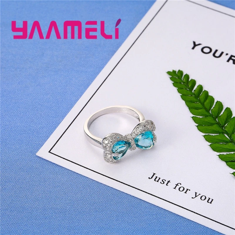 Женское серебряное кольцо с голубым бантом | Украшения и аксессуары