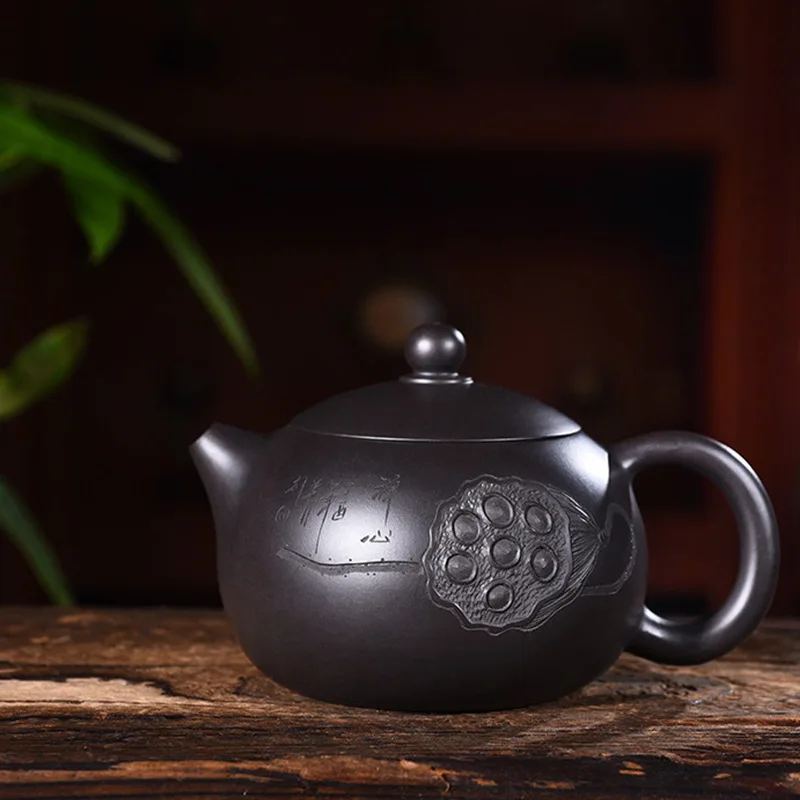 

Yixing purple clay pot genuine hand-made raw ore black mud black julienne Pengxi Shihu Kungfu Teapot Tea Set