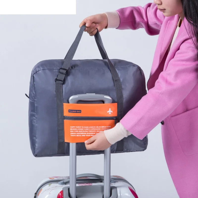 

2017 New Travel Bag Large Capacity Bag Women Nylon WaterProof Folding Bags Unisex Luggage Multifunction Travel Handbags JQ990Z
