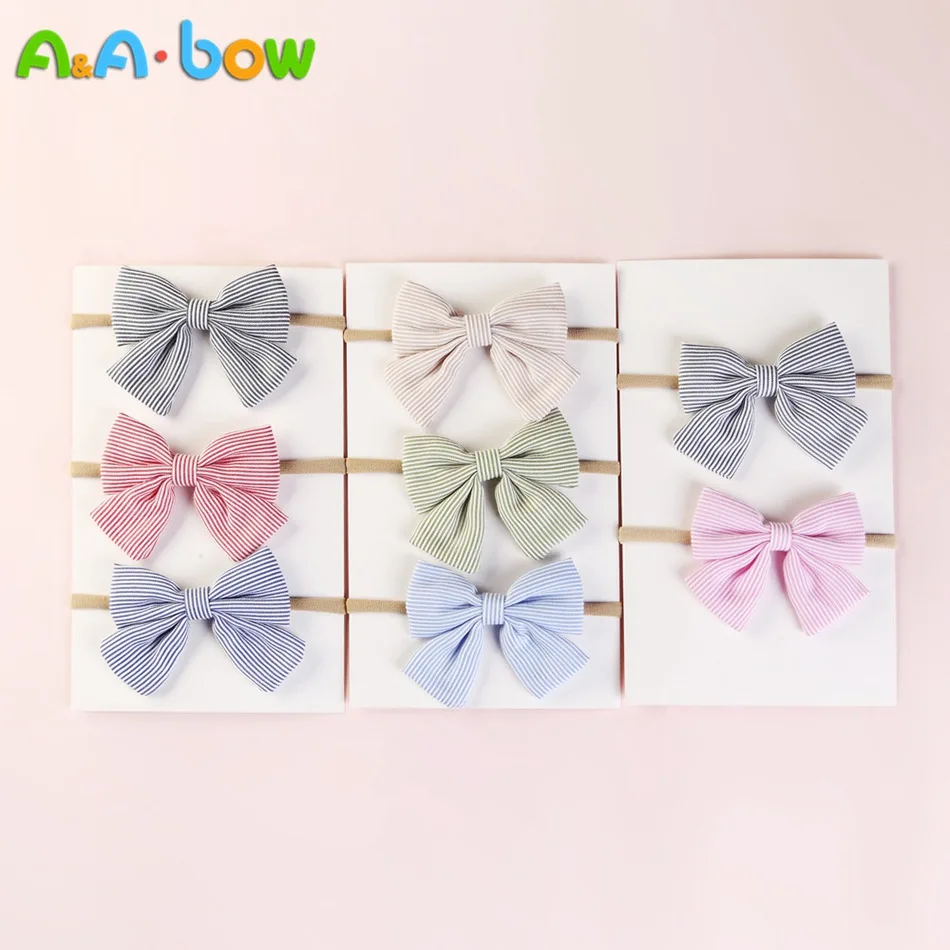 

7pcs/lot Baby Handmade Bow Cotton Headbands Bowknot Striped Elastic Nylon hairhands Girls Hair Band Nylon Bow Hair Accessories