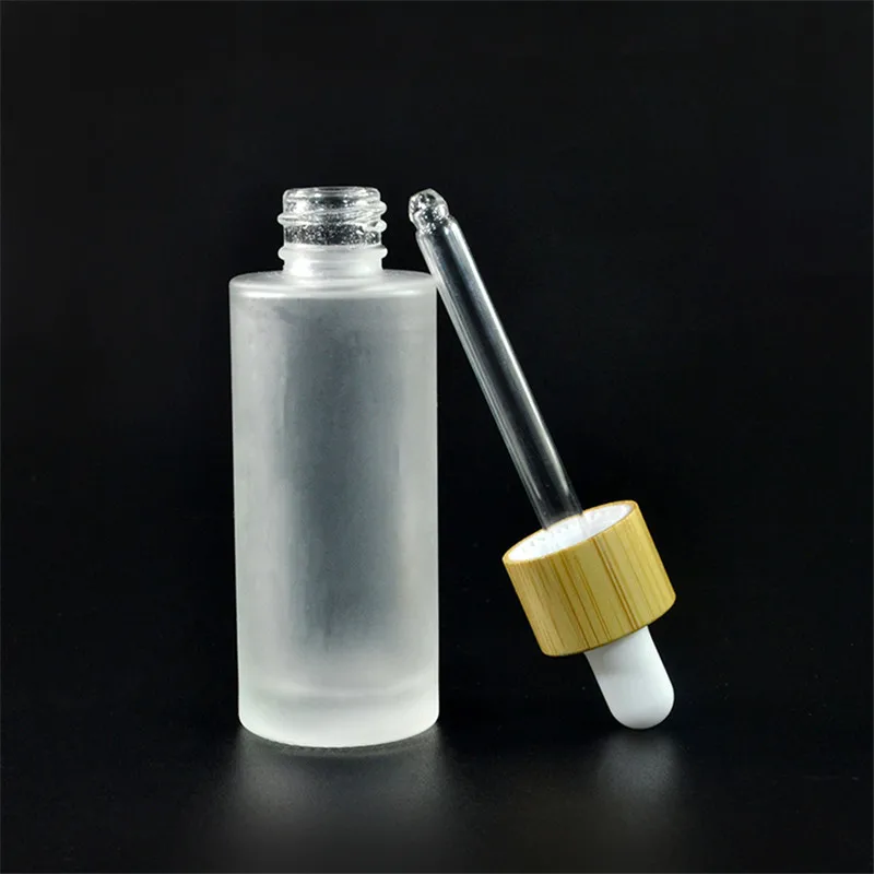 50pcs*30ml frosted clear bottle pump vacuum lotion Cosmetic Packaging for essential oil or face cream cosmetics with bamboo lid